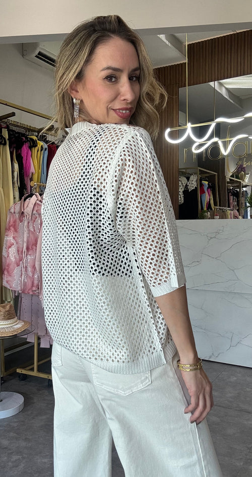 BLUSA OVERSIZE CON FLORES CAFES