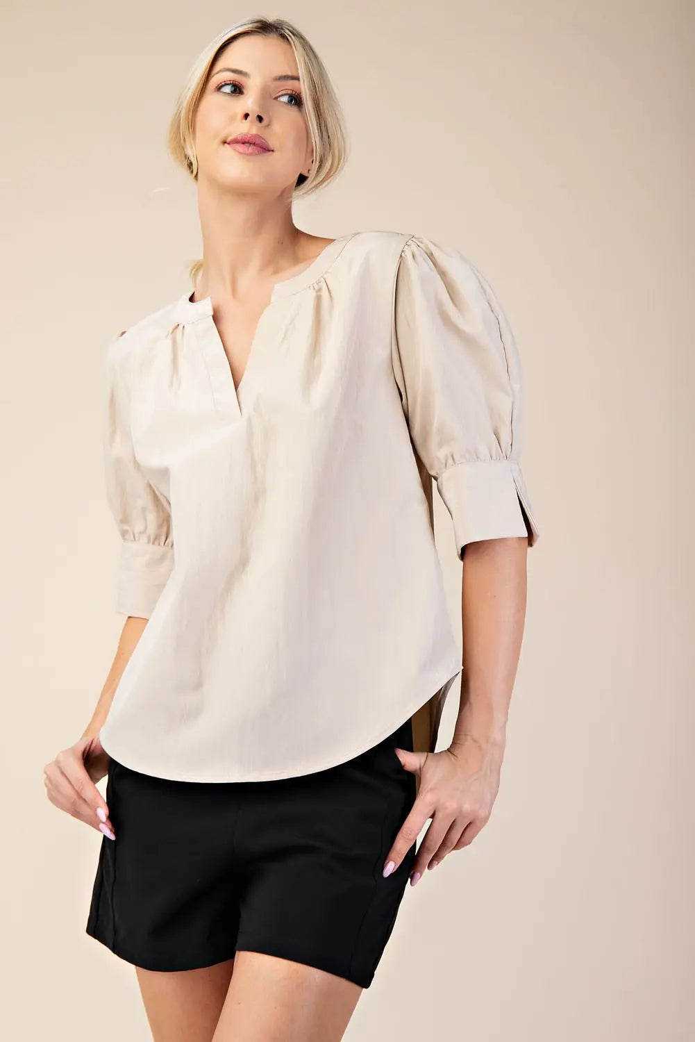 Blusa manga bombacha y cuello V