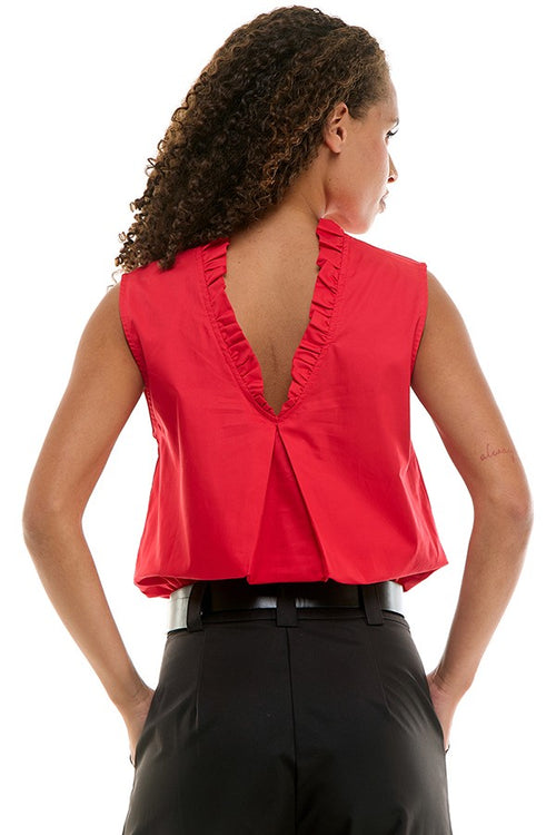 Blusa con olán en cuello y escote en espalda