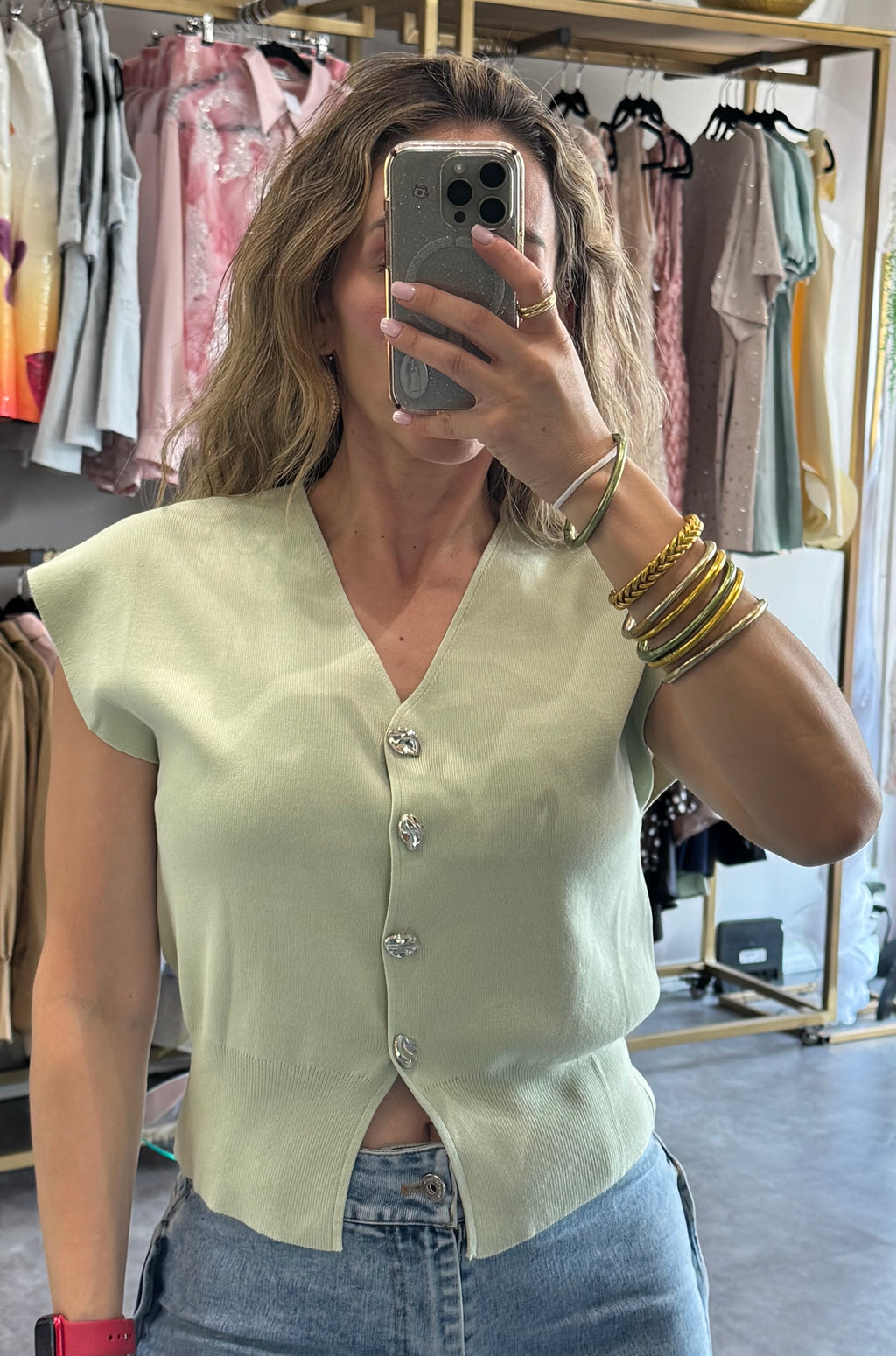 BLUSA DE PUNTO CON BOTONES PLATEADOS CHICOS