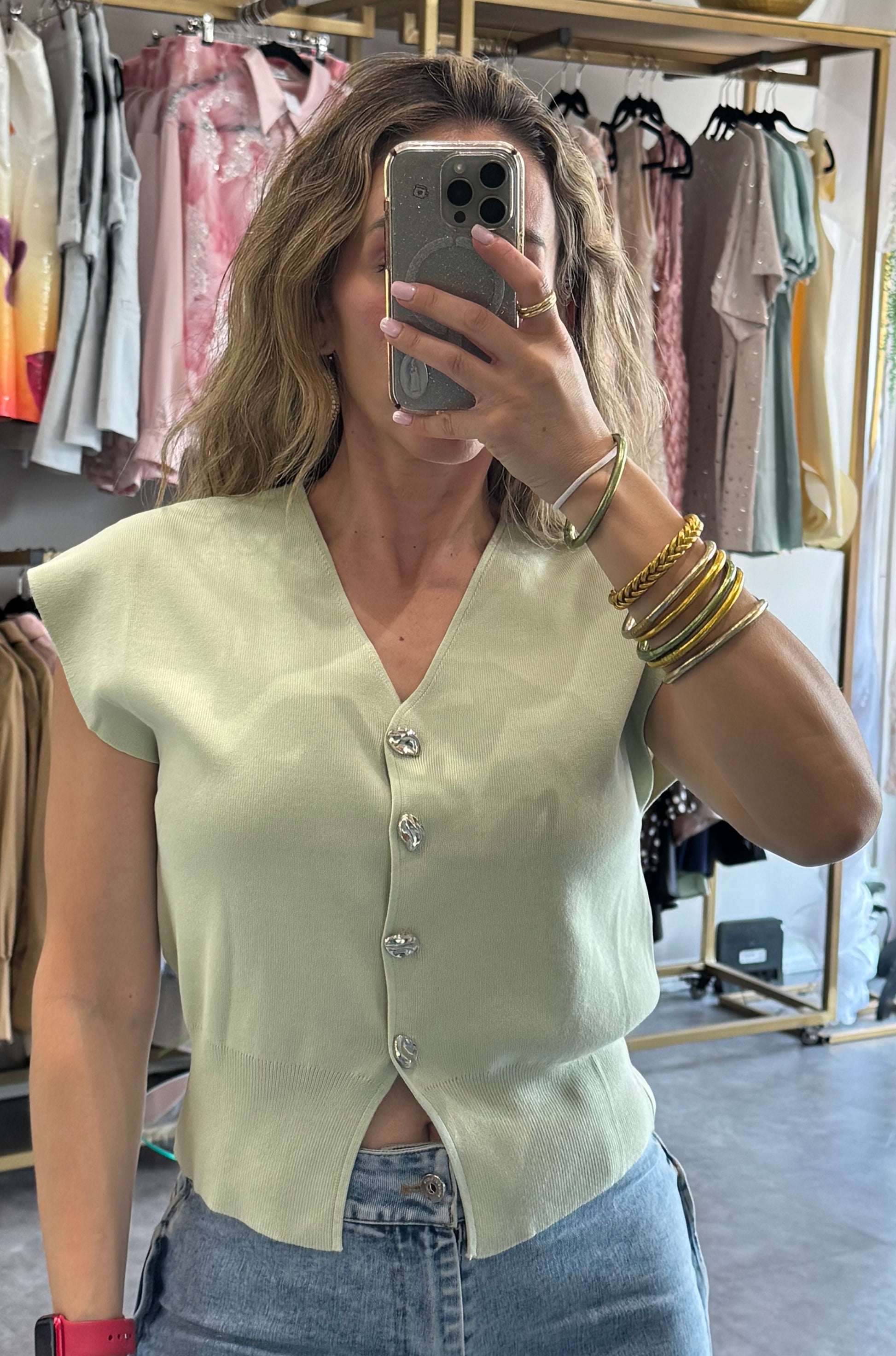 BLUSA DE PUNTO CON BOTONES PLATEADOS CHICOS
