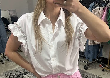 Blusa de botones con piedras en manga