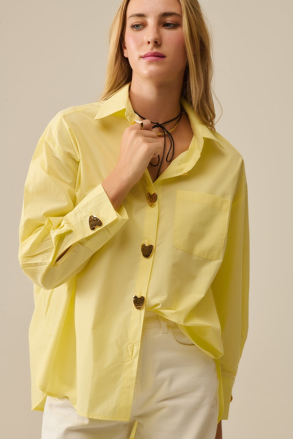 Blusa Oversize con botones de corazon